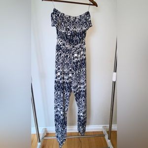 One piece pants and strapless top.